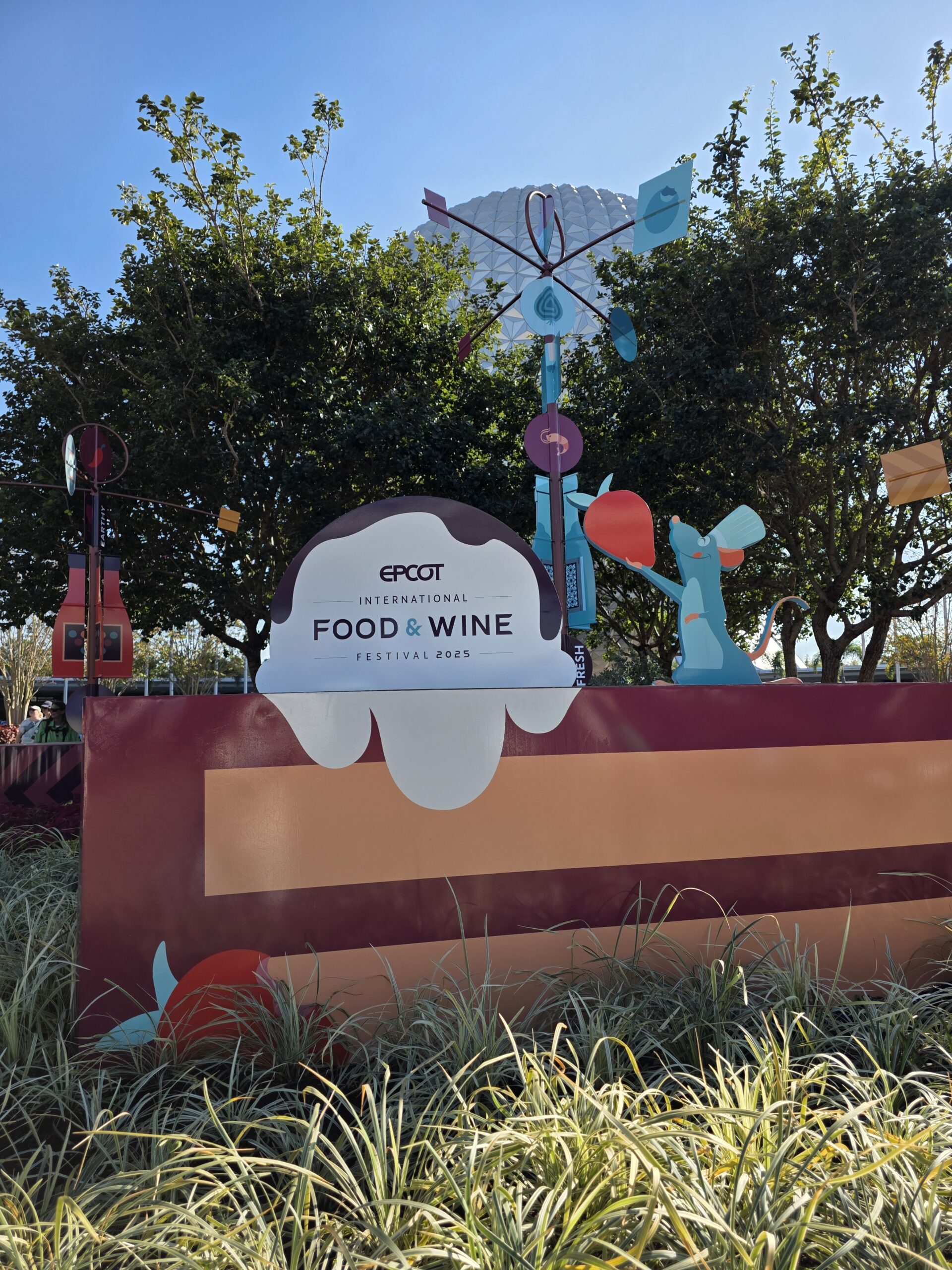 Food & Wine Festival sign featuring Remy from Ratatouille